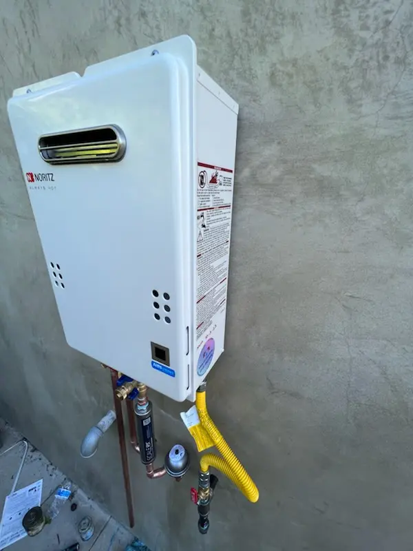 Tankless water heater installation for Woodland Village homes